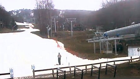 One lone snowboarder at the base of Sugar at 9:50am