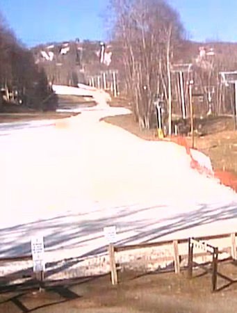 The narrow strip of snow left at the base is clearly visible at Sugar.