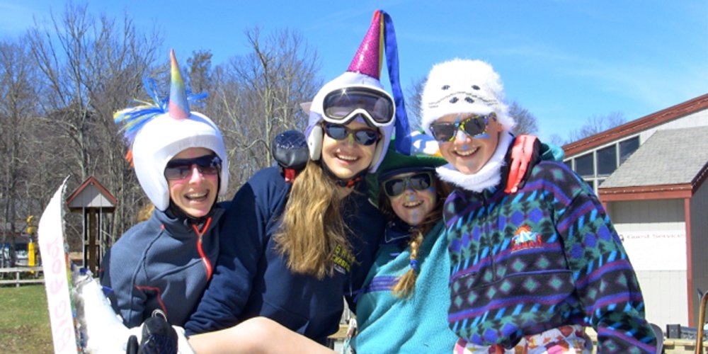 Break out the sunscreen and whatever's weirdly appropriate and get yourself out on the hill! These folks were having fun on Sugar's last day last year. Photo by Randy Johnson